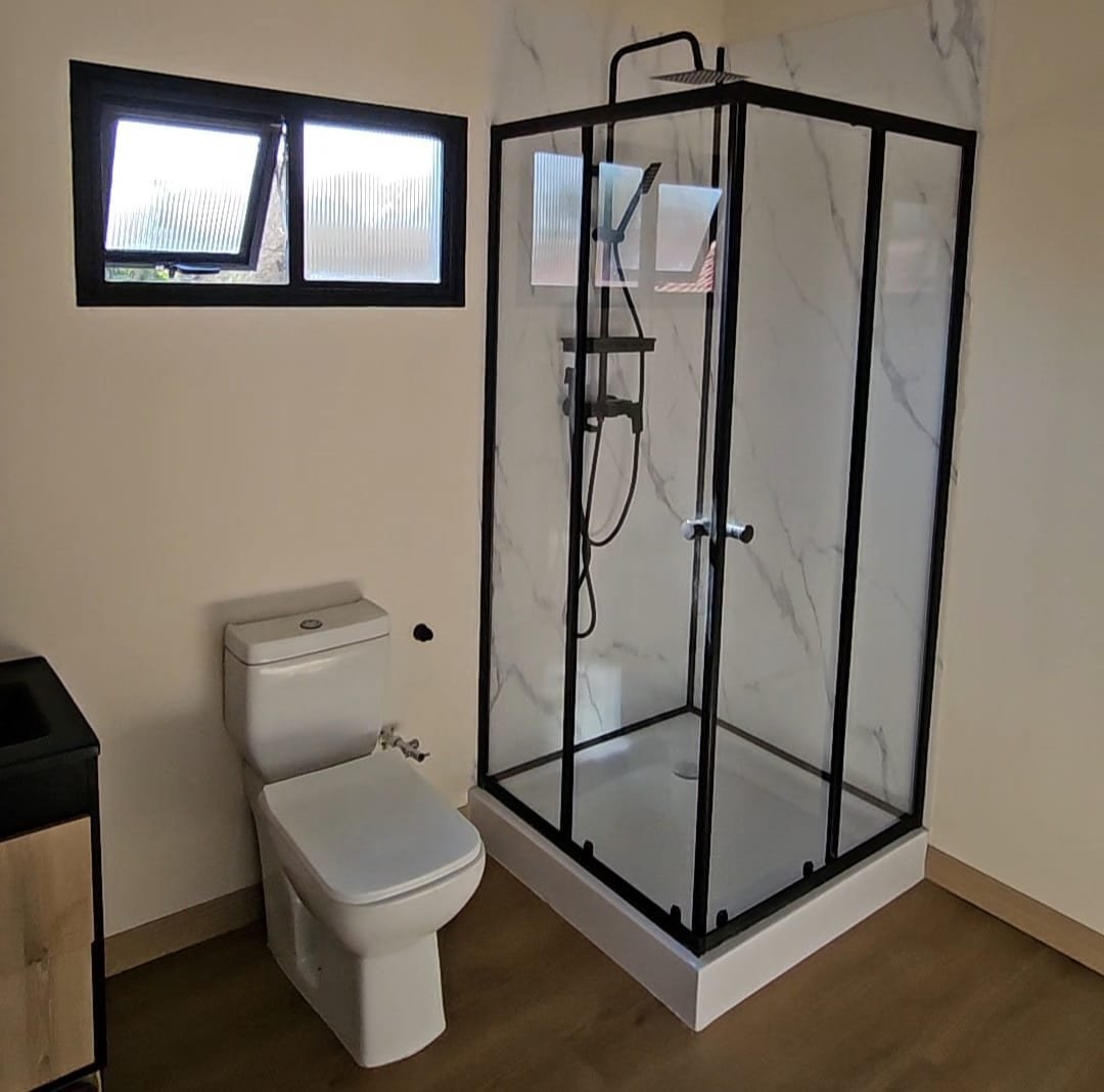 2 Bedroom Pod bathroom with corner shower