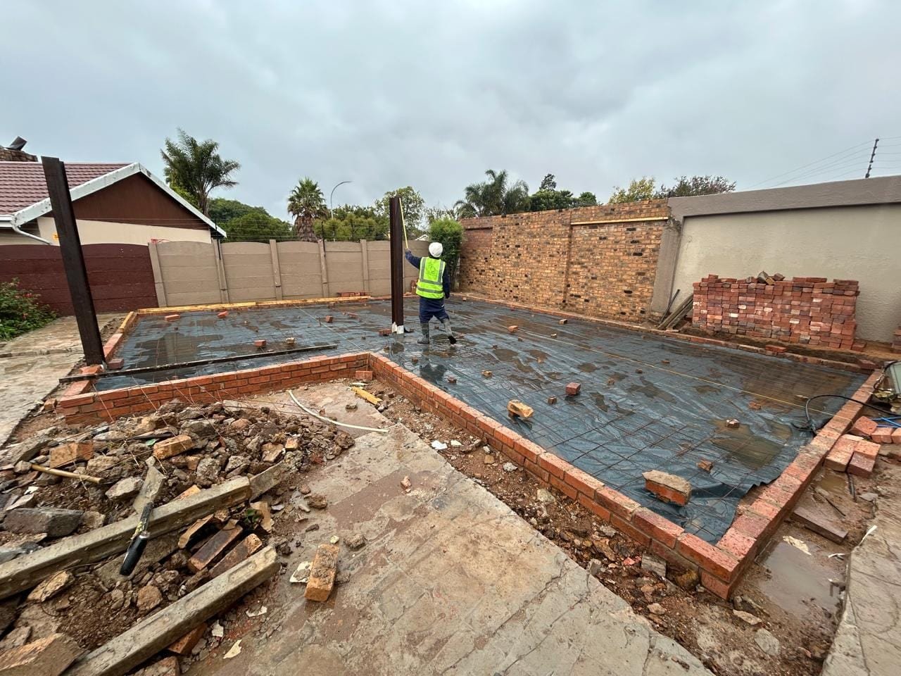 Foundation preparation — reinforcing mesh and brick footings, Farrarmere entertainment area build
